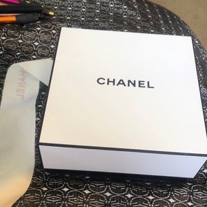 Chanel box and gold ribbon